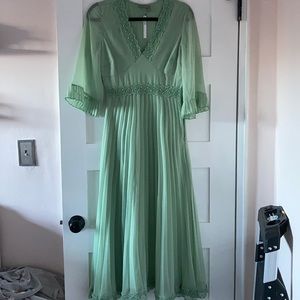Green pleated midi dres